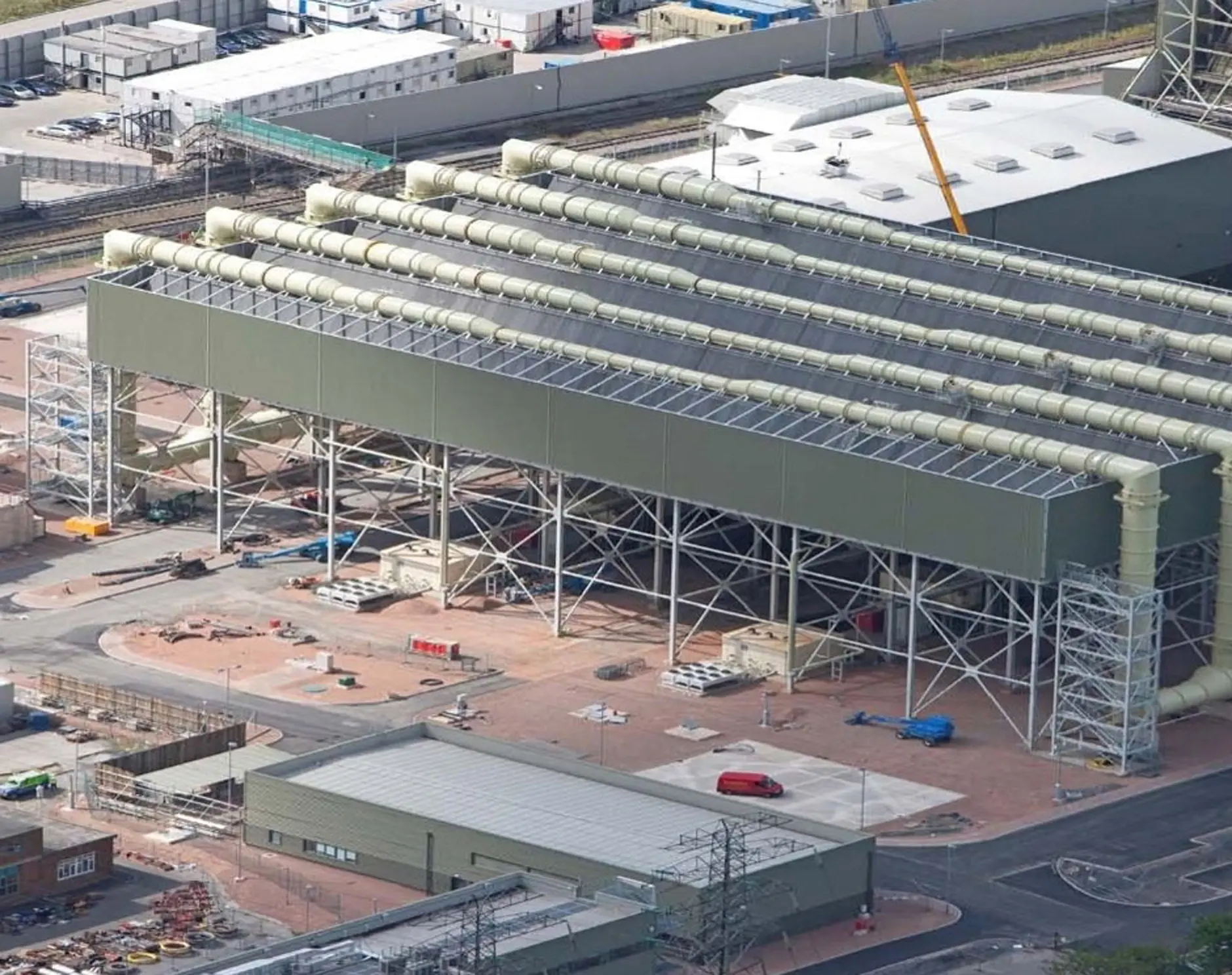 Air cooled condenser steel structure with long inclined bundles on an open site, seen from above
